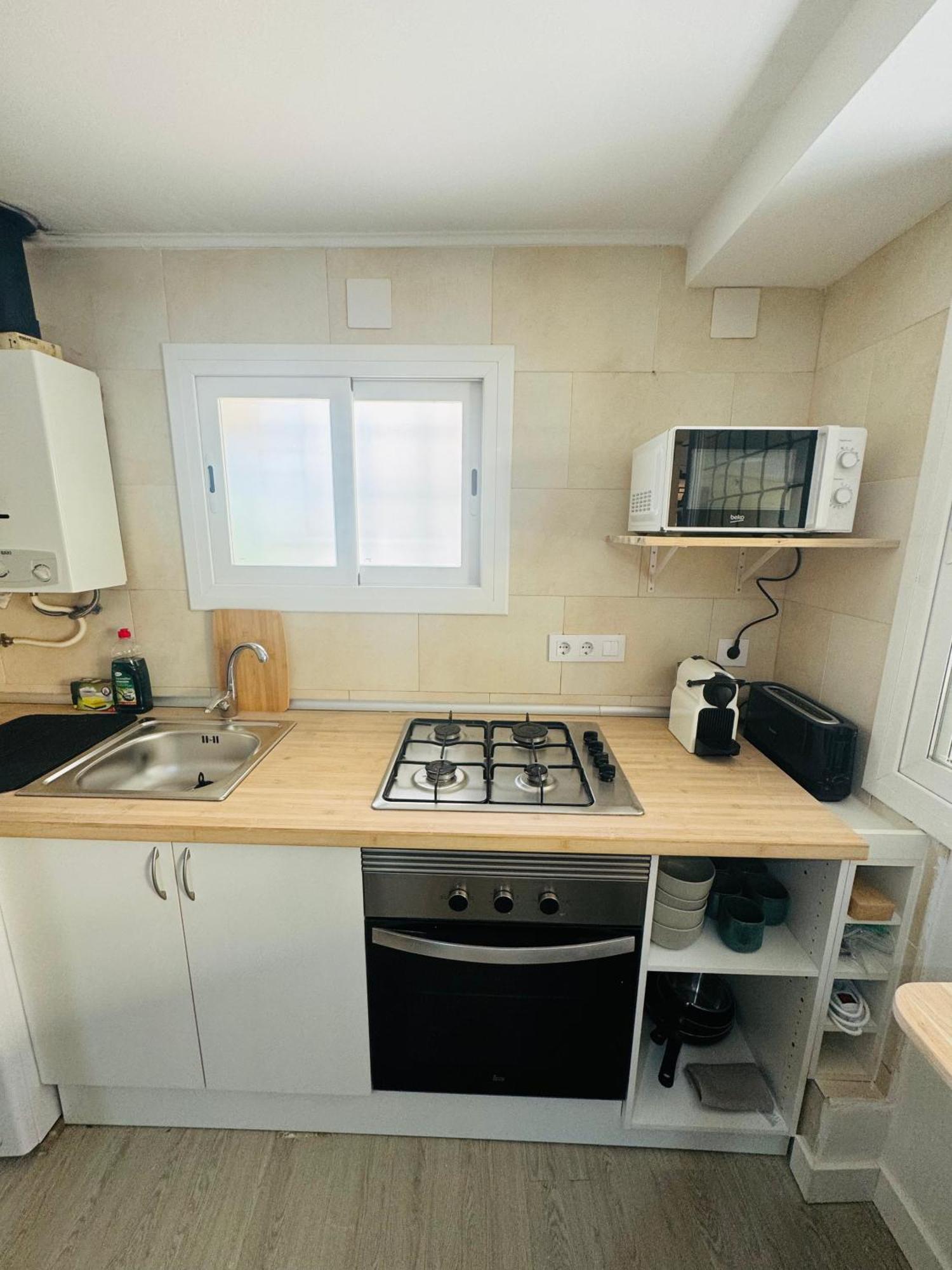 Piso Con Jardin, De Playa Fenals Appartement
