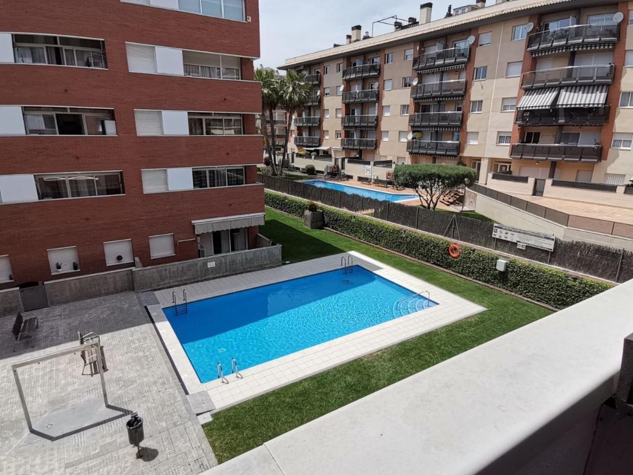 Apartamento+parking +piscina A 250mts Playa Fenals Apartment Lloret de Mar